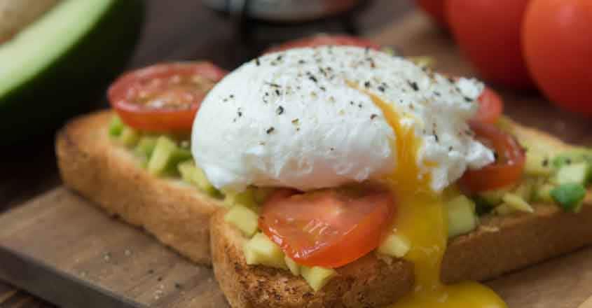poached egg Ready to eat toast with poached egg and veggies served for two